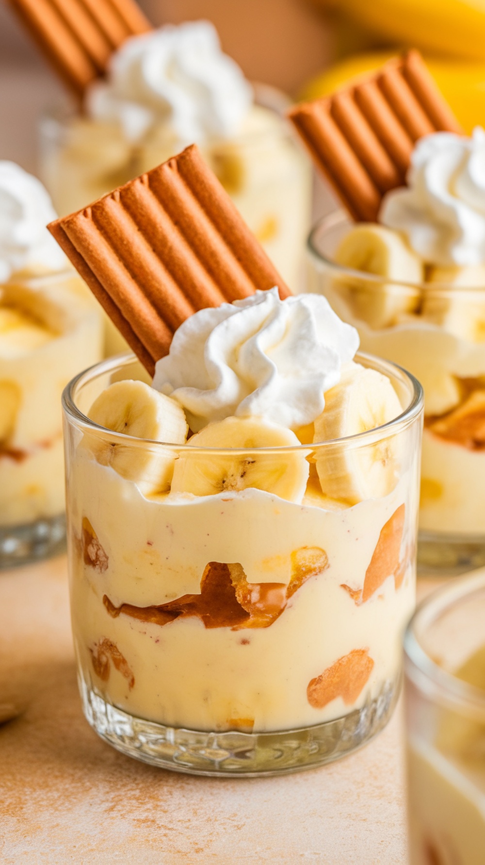 Delicious banana pudding cups with whipped cream and wafers