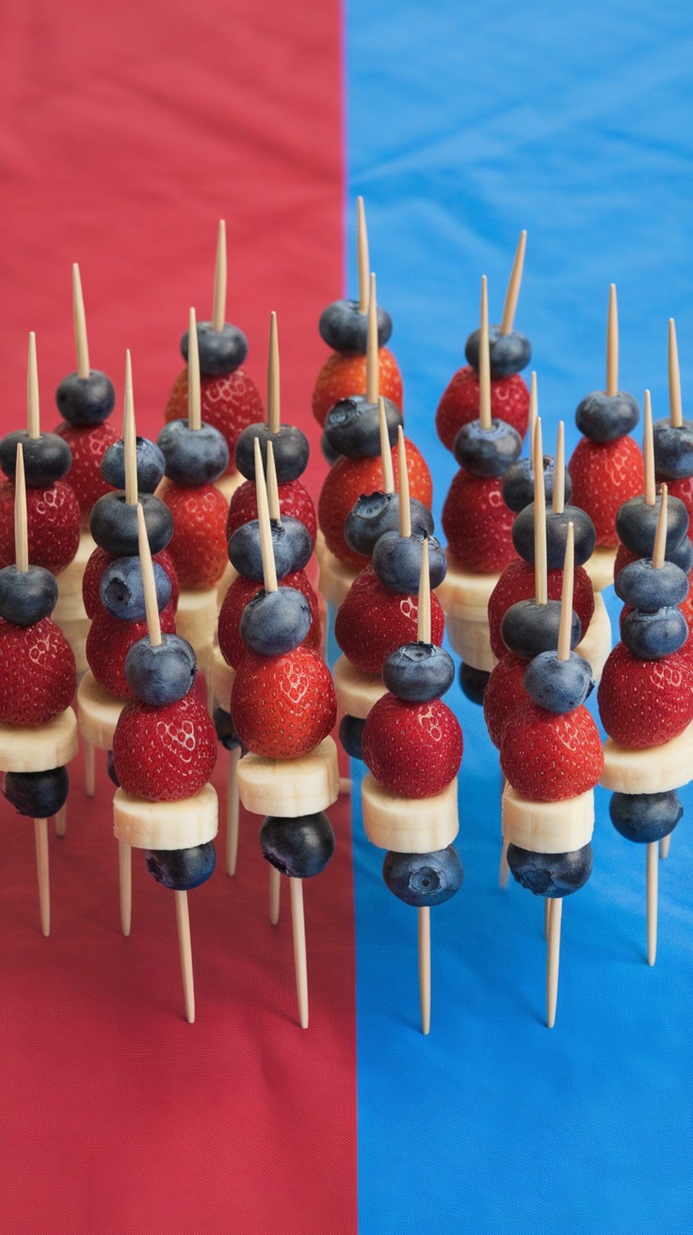 Colorful fruit skewers with strawberries, bananas, and blueberries