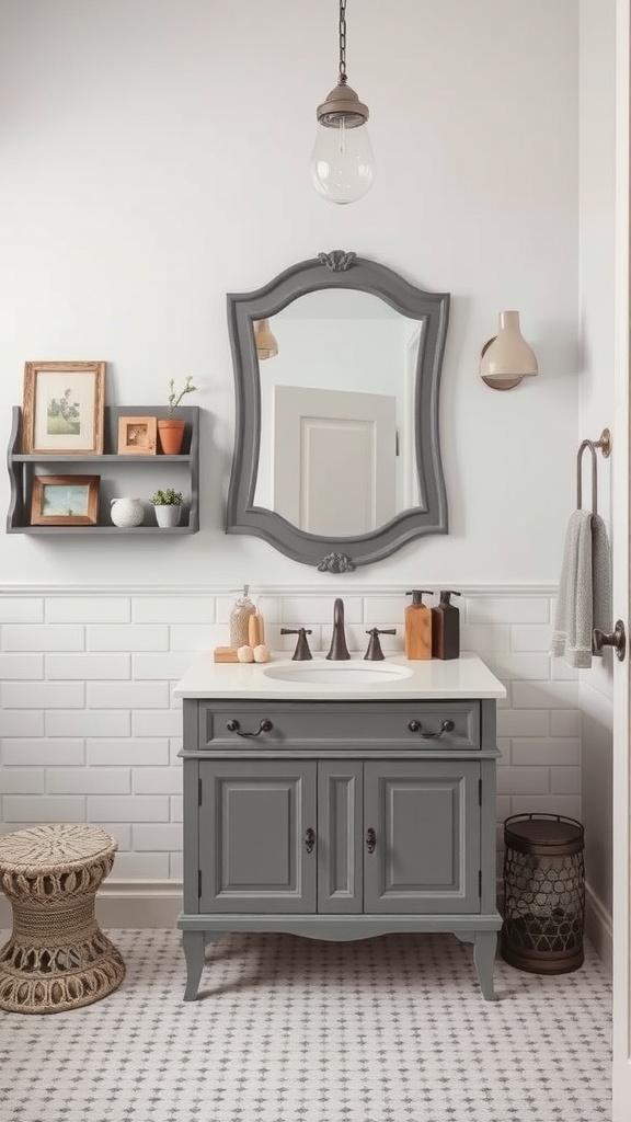 A stylish bathroom featuring a vintage-inspired gray vanity, antique mirror, wall shelf with framed pictures, and warm lighting.