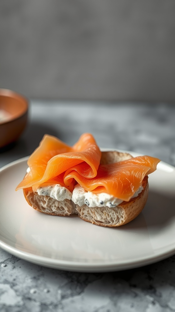 A bagel topped with cream cheese and smoked salmon on a plate.