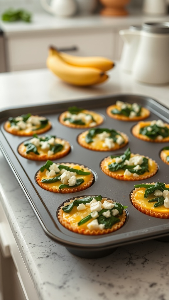 A tray of egg muffins with spinach and feta, ready for meal prep.