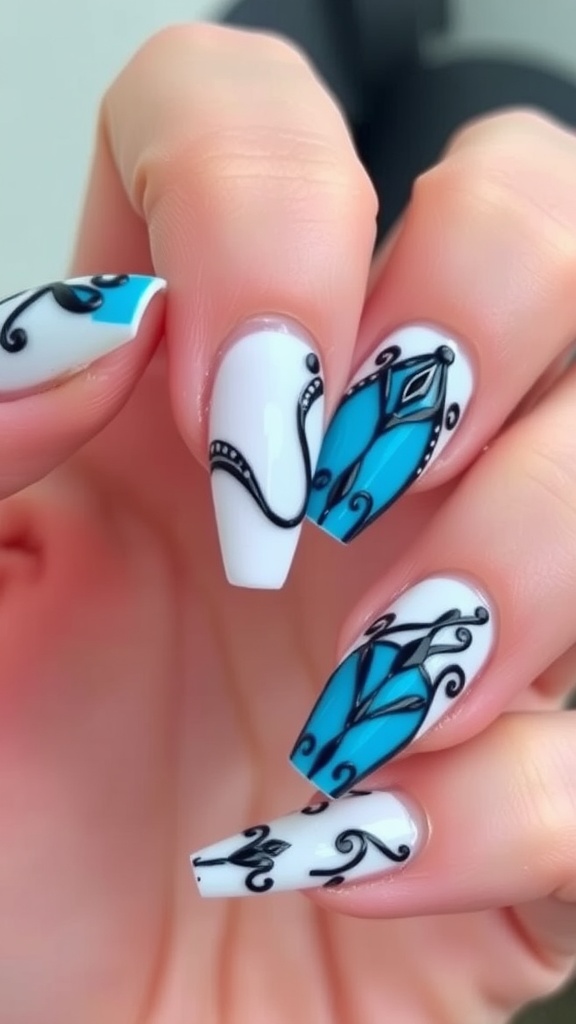 Shorter acrylic nails with a white and blue design featuring intricate patterns.
