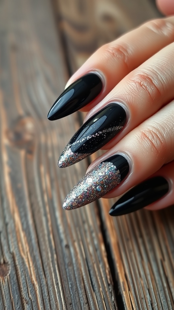 Long coffin-shaped nails featuring black French tips with a glittery silver accent nail.