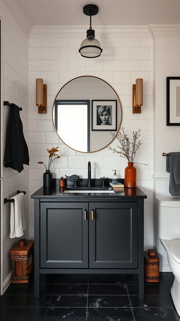 A modern black bathroom vanity with round mirror, stylish accessories, and warm accents.