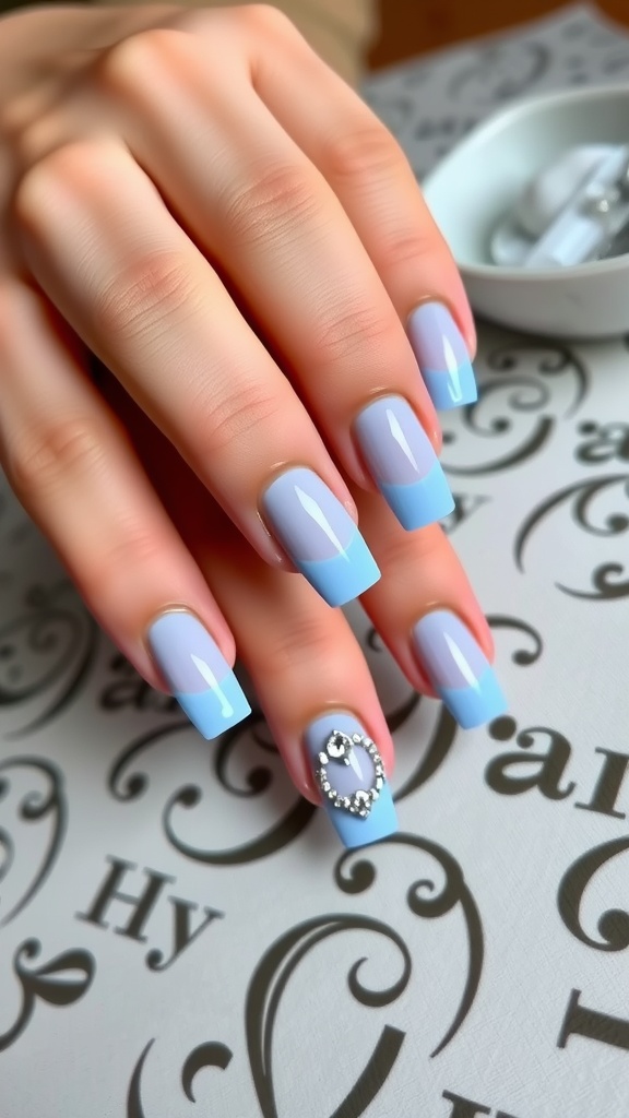 Chic light blue French tip nails with rhinestones
