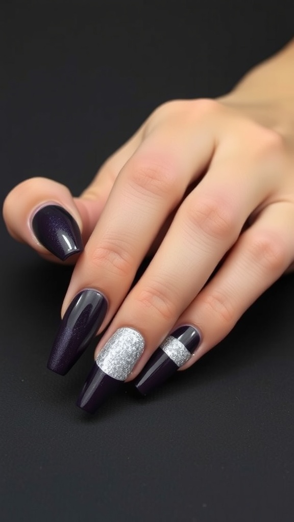 Nails styled in dark purple with silver glitter tips