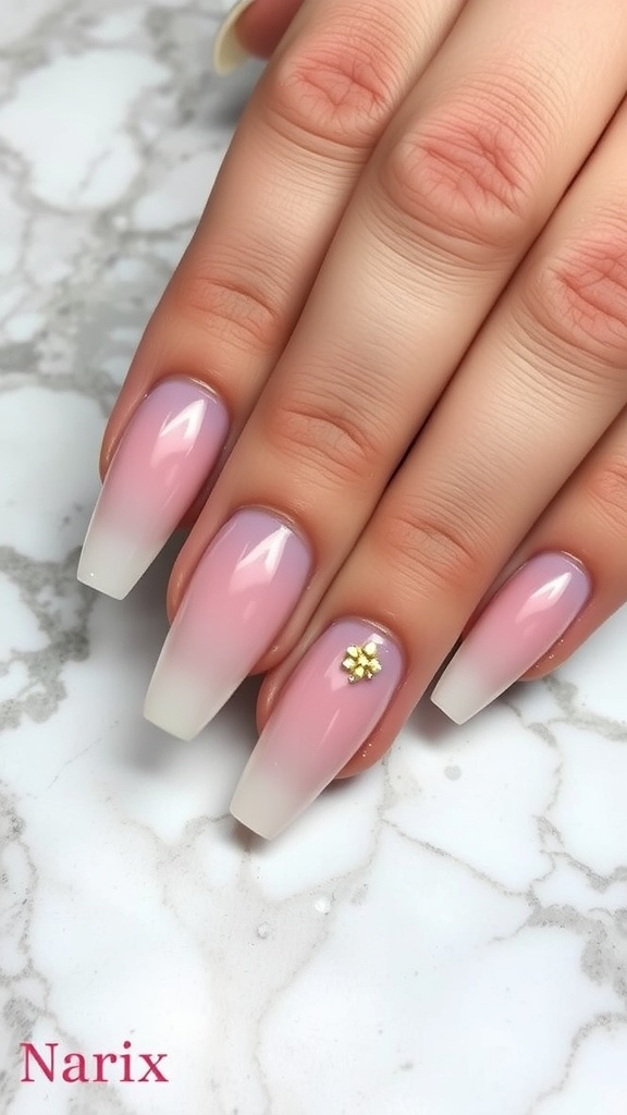 Elegant gradient French tip nails with a floral accent