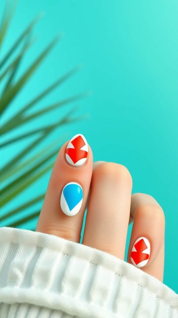 Nails with geometric patterns in red and blue on a light background
