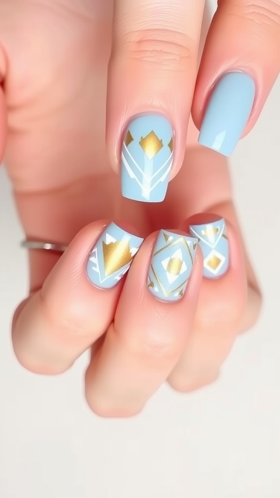 Light blue nails with geometric patterns and gold accents