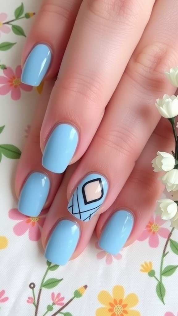 Close-up of light blue spring nails with geometric patterns