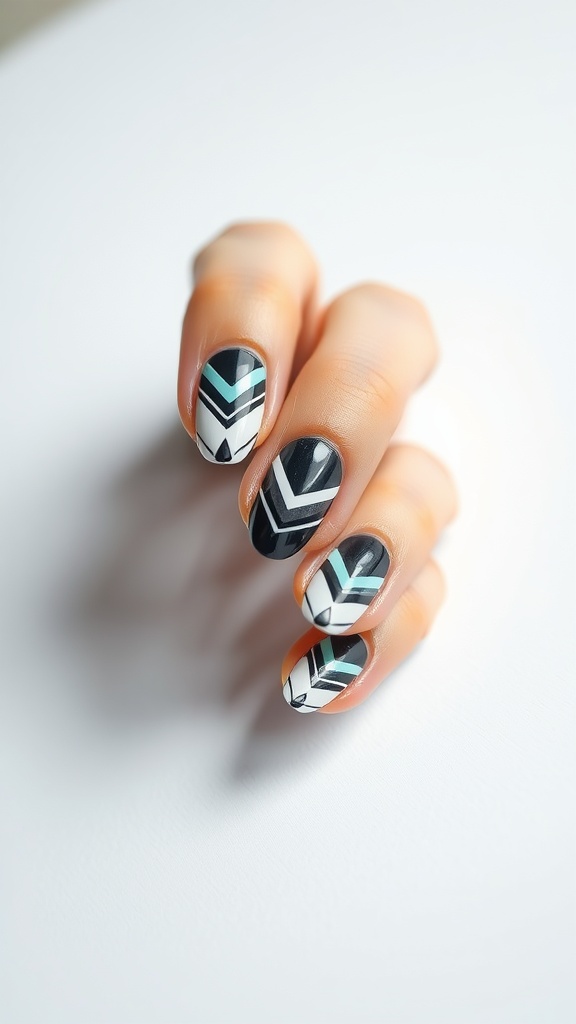 Almond nails with geometric patterns in black, white, and teal.