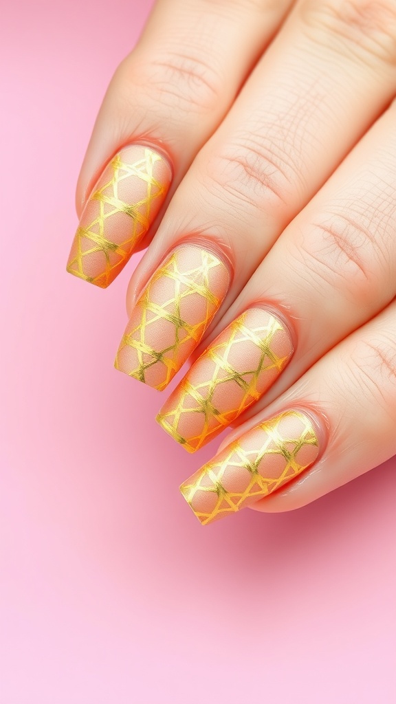 Nails with gold geometric patterns on a pink background.