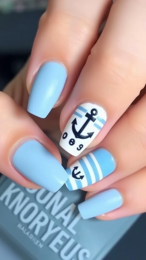 Light blue nautical themed nail art with anchor and stripes.