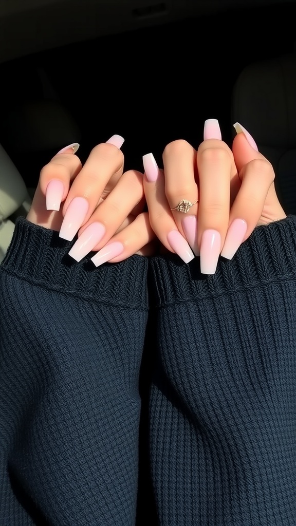 Nude acrylic nails in a soft gradient style, showing both short and long lengths.