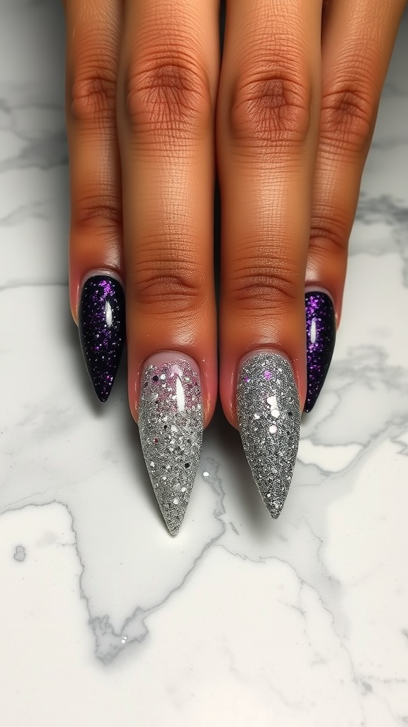 Close-up of ombre glitter stiletto nails with purple and silver shades.