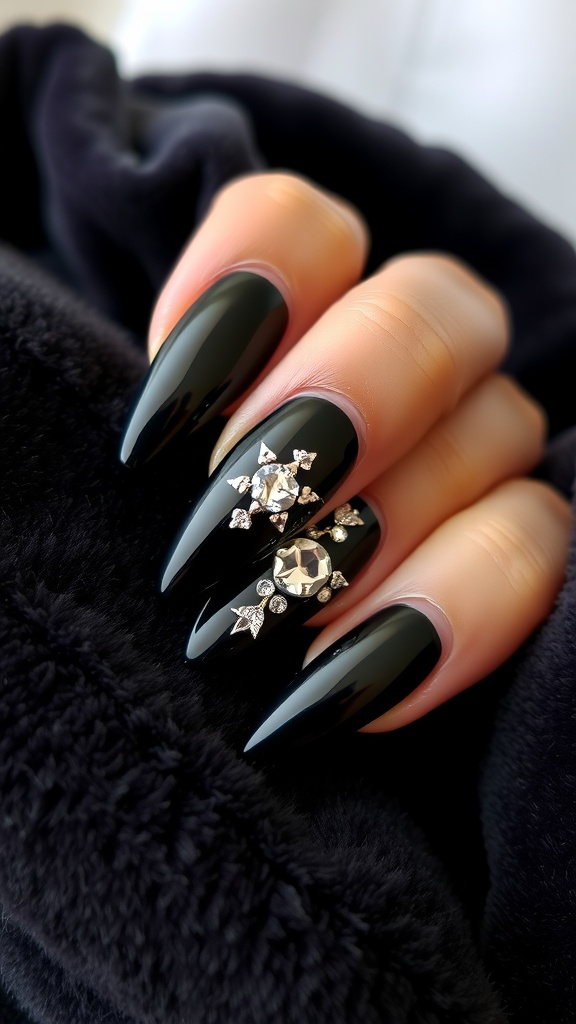 Close-up of textured black acrylic nails adorned with rhinestones.