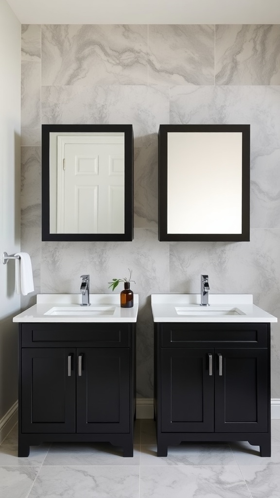 A modern bathroom with two black cabinets featuring a matte finish, placed against light grey marble wall tiles.