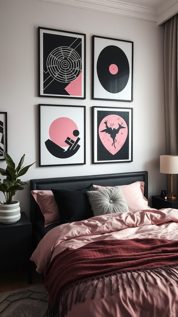 A black and pink themed bedroom with framed artwork on the wall, featuring geometric patterns and playful designs.