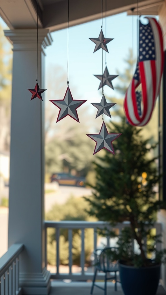 A porch decorated with hanging red, white, and blue stars and an American flag.