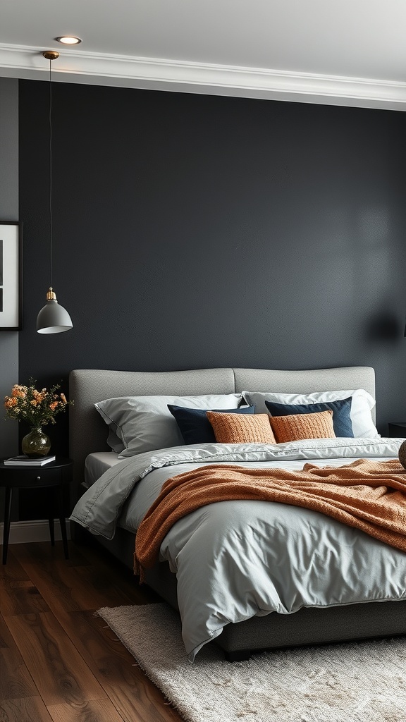A cozy bedroom featuring a black accent wall, soft bedding, and warm textures.