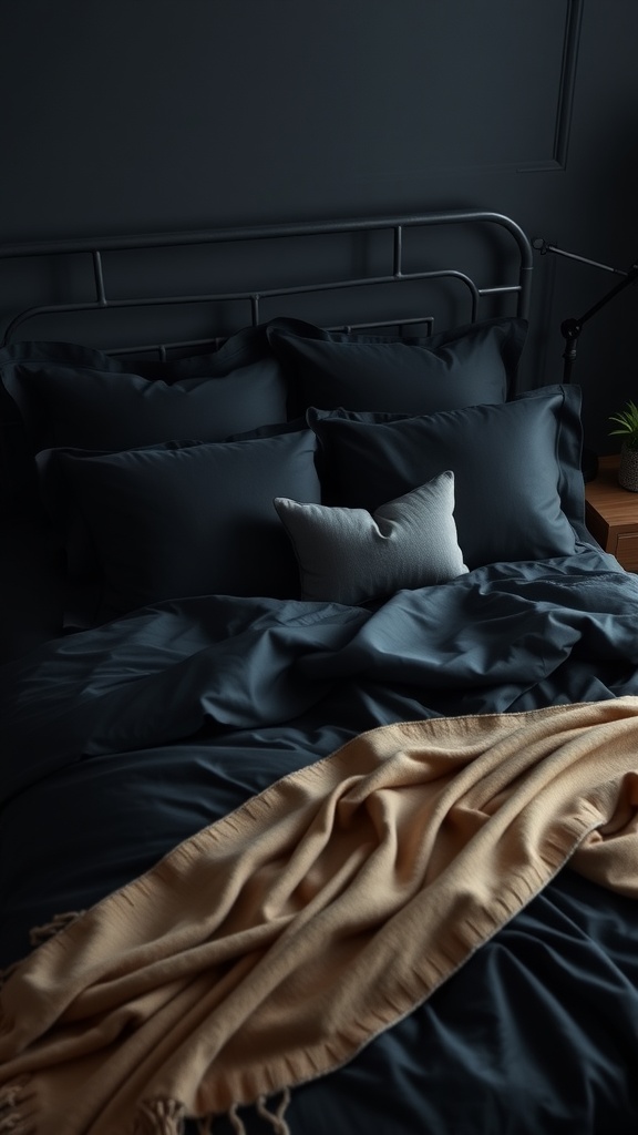 Luxurious black bedding with plush pillows and a beige throw blanket on a stylish bed.