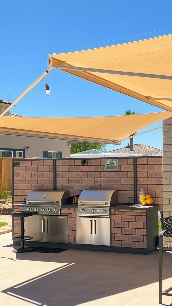 Outdoor kitchen with retractable awning providing shade over stainless steel grills.