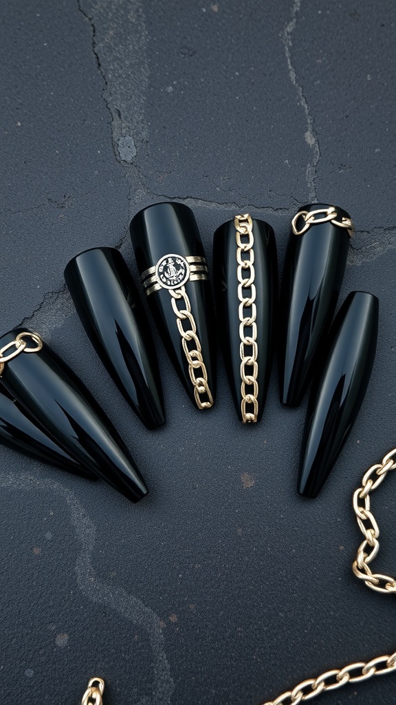 Matte black nails with gold chain accents