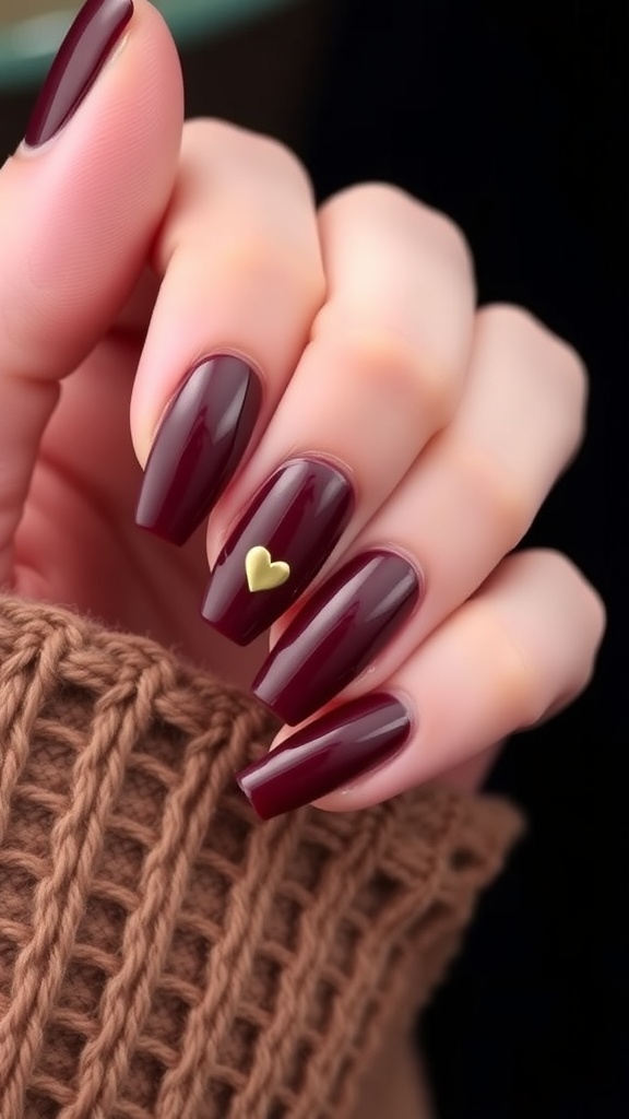 Glossy cherry brown nails with a heart accent, set against a fall background