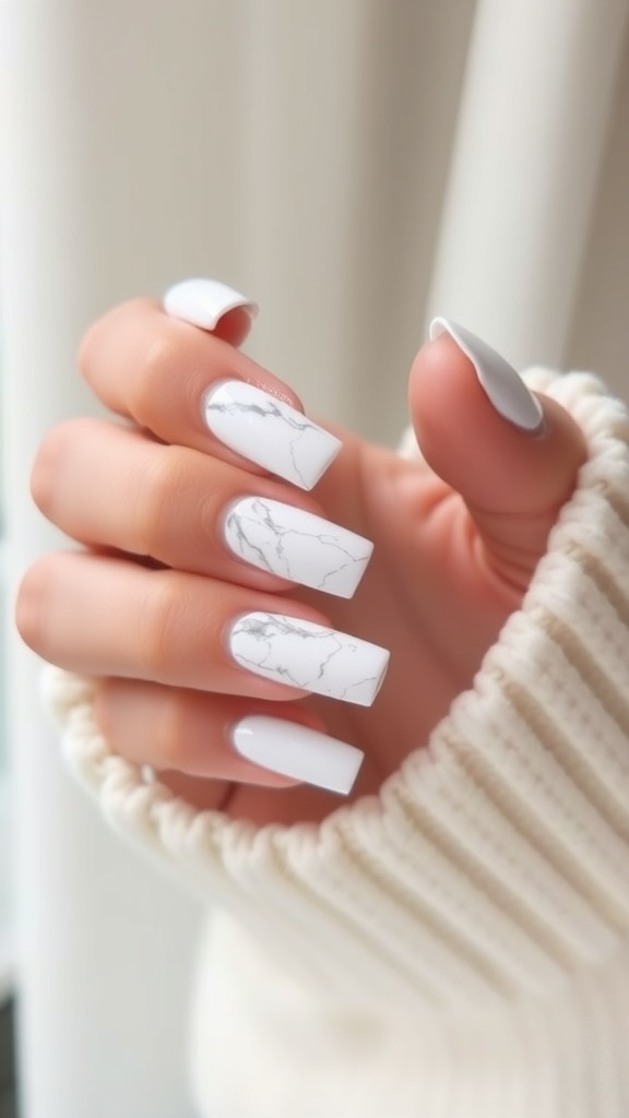 White French nails with marble effect design