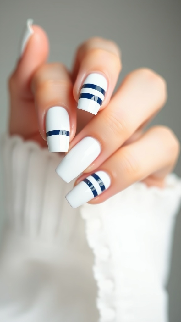 White French nails with navy stripes design