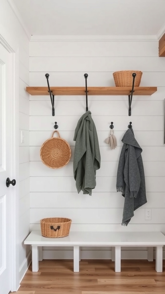 A cozy mudroom featuring hooks for coats and woven baskets for storage.