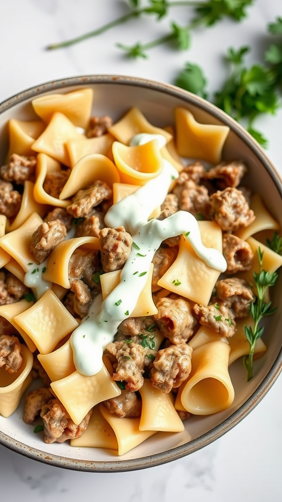 A bowl of creamy beef and bowtie pasta topped with ranch dressing and herbs.