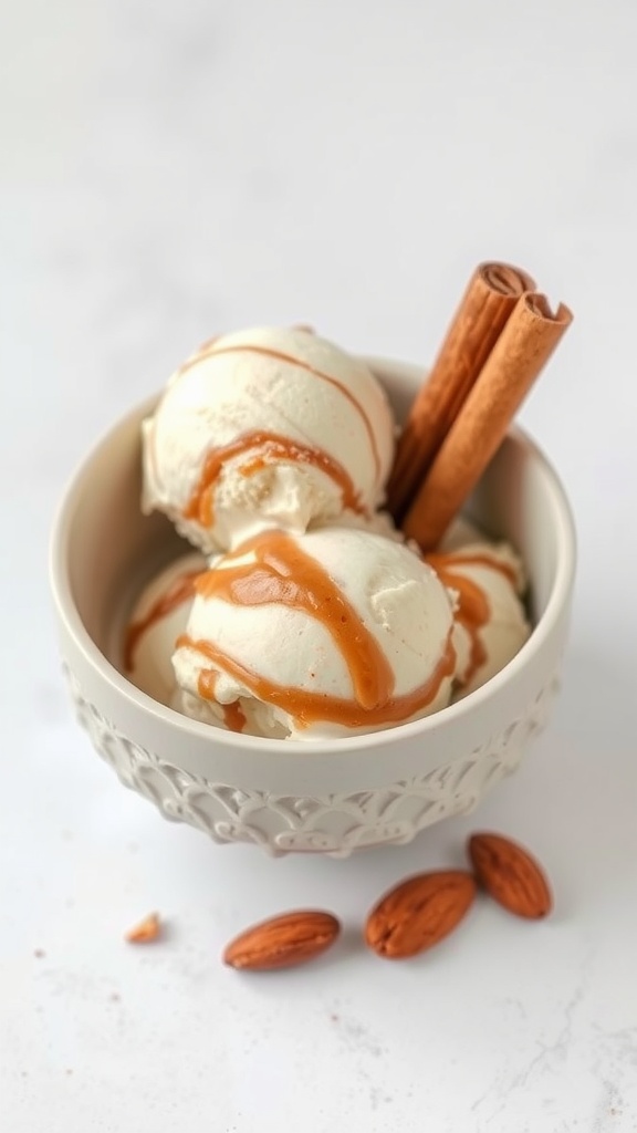 A bowl of cinnamon swirl almond ice cream topped with a caramel drizzle and cinnamon sticks