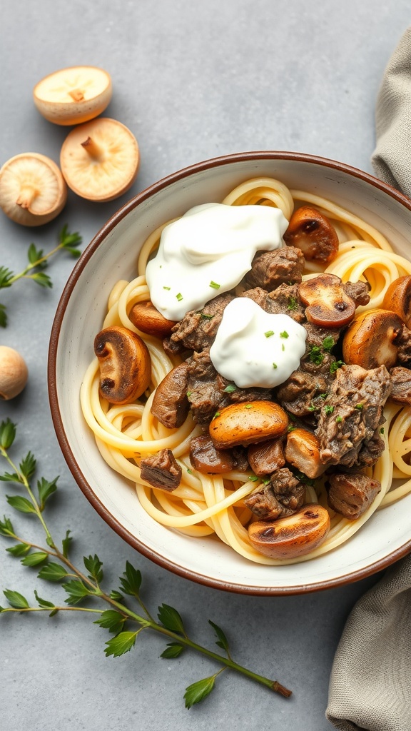 A bowl of Keto Beef Stroganoff served with mushrooms and creamy sauce on a bed of noodles.