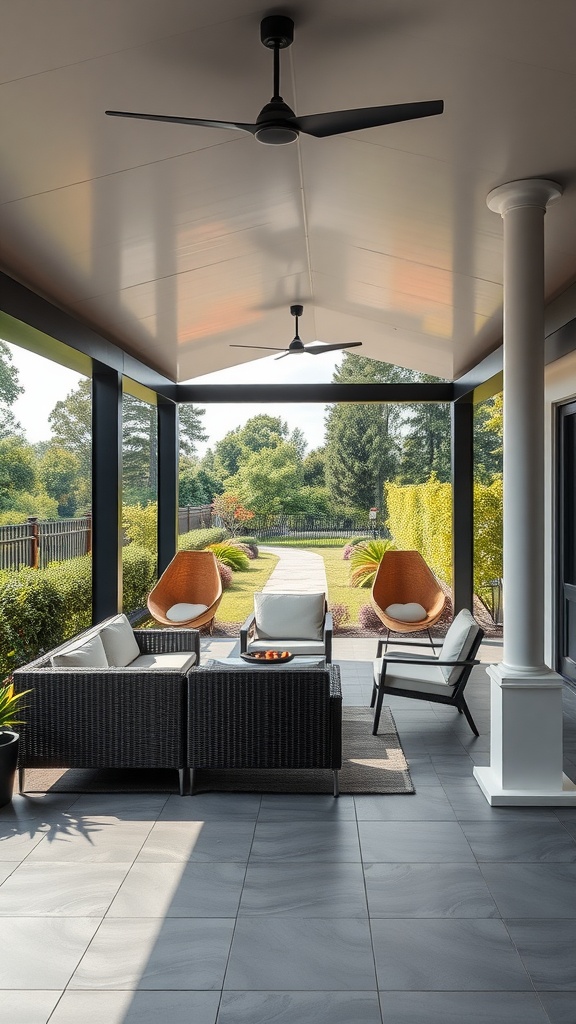 Modern minimalist outdoor patio with a seating area, ceiling fans, and large windows overlooking a garden.