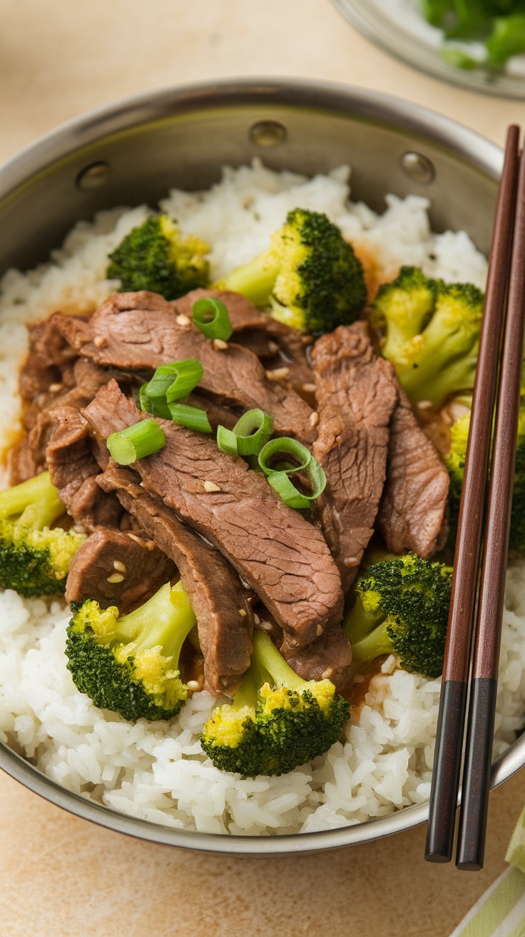 A bowl of beef and broccoli served over rice with green onions on top