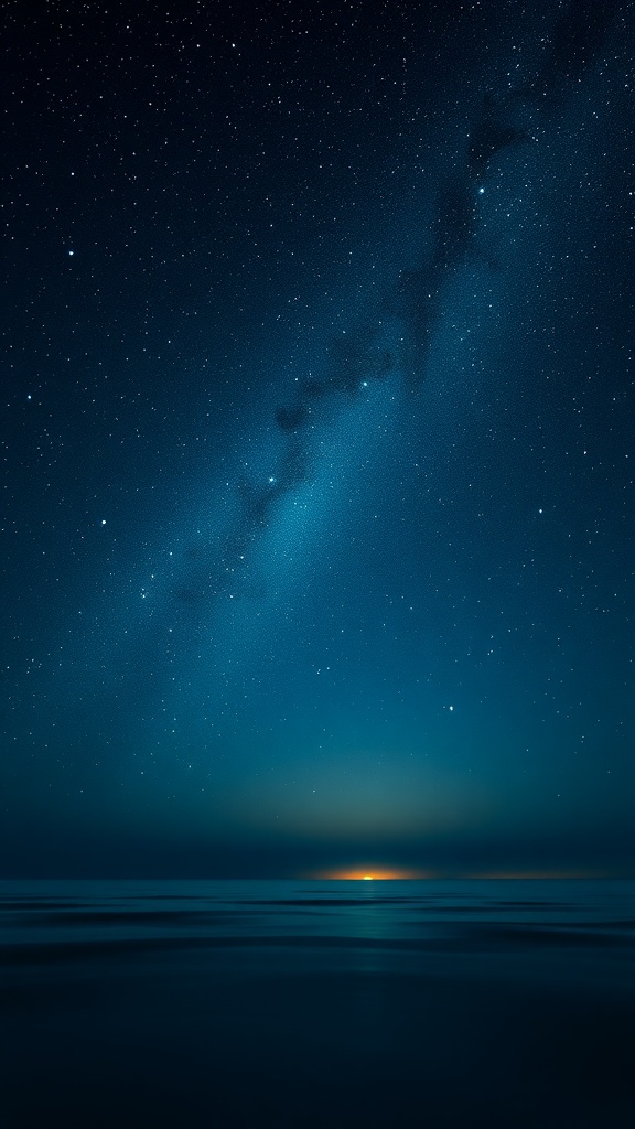 A starry night sky over a calm ocean with a glowing horizon.