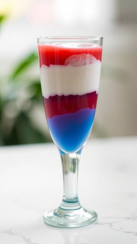 A layered jello dessert featuring red, white, and blue colors for a patriotic theme.